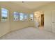 Bright bedroom boasting three windows with great view and features attached bathroom with double vanity at 485 Sapphire Dr, Castle Rock, CO 80108