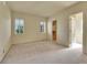 Spacious bedroom with natural light from shuttered windows and easy access to closet at 485 Sapphire Dr, Castle Rock, CO 80108