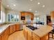 Gourmet kitchen with granite countertops, stainless steel appliances, and a center island with a gas cooktop at 485 Sapphire Dr, Castle Rock, CO 80108