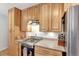 Well-equipped kitchen with stainless steel appliances and abundant storage space at 4040 S Inca St, Englewood, CO 80110