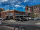 Exterior view of Blue Sky Market and other shops within a retail complex at 3225 S Race St, Englewood, CO 80113