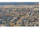 Aerial view of a residential neighborhood showcasing various house styles and landscaping at 1605 Io Ct, Lafayette, CO 80026