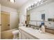 Bathroom with a large vanity and bathtub at 1605 Io Ct, Lafayette, CO 80026