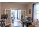 Home office featuring french doors, a desk, and neutral decor at 2614 Curtis St, Denver, CO 80205