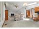 Spacious living room with high ceilings, natural light, and an open floor plan at 1373 S Cape Way, Lakewood, CO 80232