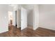 Bright bedroom boasts hardwood floors, neutral walls, and closet access for a condo at 3205 S Walden Ct # B, Aurora, CO 80013