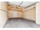 Spacious garage with storage shelving at 3205 S Walden Ct # B, Aurora, CO 80013