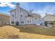 Backyard view of the home with a patio, grill, and fenced yard at 270 N Holcomb Cir, Castle Rock, CO 80104