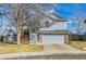 Charming two-story home featuring a well-manicured front yard and attached two-car garage at 270 N Holcomb Cir, Castle Rock, CO 80104