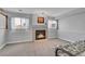 Basement living room featuring a fireplace and neutral tones at 270 N Holcomb Cir, Castle Rock, CO 80104