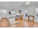 Bright living room boasts vaulted ceilings, wood floors, a ceiling fan, and ample natural light at 270 N Holcomb Cir, Castle Rock, CO 80104