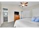 Comfortable main bedroom with vaulted ceiling and a view of the ensuite bathroom at 270 N Holcomb Cir, Castle Rock, CO 80104