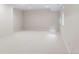 Large, open basement featuring neutral carpet and paint, ready for customization at 538 Cook St, Denver, CO 80206