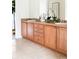 Elegant bathroom featuring double sinks with a quartz countertop at 538 Cook St, Denver, CO 80206