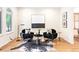 Bright living room showcasing hardwood floors, modern decor, and a large window for natural light at 538 Cook St, Denver, CO 80206
