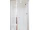 Clean, well-lit shower with a glass door and white tile surround at 538 Cook St, Denver, CO 80206
