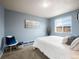 Charming bedroom with natural light, cozy decor, and neutral-toned walls at 155 S Pennsylvania St # 310, Denver, CO 80209