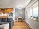 Charming dining area featuring a table for two and a large window providing natural light at 155 S Pennsylvania St # 310, Denver, CO 80209