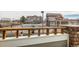 A view of the neighborhood pool, clubhouse, and surrounding residential buildings from an elevated vantage point at 12888 Jasmine St # F, Thornton, CO 80602