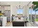Eat-in kitchen features a dining area with a view of the outdoor space at 21 N Edge Cliff St, Castle Rock, CO 80104