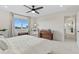 Relaxing bedroom with soft carpet, large windows, and neutral decor for a serene atmosphere at 21 N Edge Cliff St, Castle Rock, CO 80104