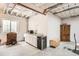 Unfinished basement with high ceilings, storage, concrete floor, cabinets, window, and neutral paint at 8153 S Ider Ct, Aurora, CO 80016