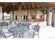 Relaxing community area with a cozy fireplace, comfortable seating, and an inviting atmosphere at 8153 S Ider Ct, Aurora, CO 80016