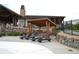 Relax by the pool with comfortable lounge chairs under a covered gazebo for the ultimate outdoor experience at 8153 S Ider Ct, Aurora, CO 80016
