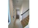 Bright entryway with light wood floors and modern staircase at 1252 Yates St, Denver, CO 80204