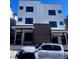 Modern two-story duplex with clean lines and dark brick accents at 1252 Yates St, Denver, CO 80204