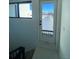 Private rooftop deck access from interior; snowy view at 1252 Yates St, Denver, CO 80204