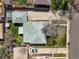Birds eye view of a home and garage featuring a manicured lawn at 2562 S Xavier St, Denver, CO 80219