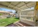 A covered patio and lush, grassy backyard is perfect for entertaining at 2562 S Xavier St, Denver, CO 80219