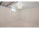 Finished basement features a window for natural light and decorative lighting at 2562 S Xavier St, Denver, CO 80219