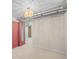 Finished basement area showcases overhead lighting and a large closet at 2562 S Xavier St, Denver, CO 80219
