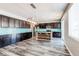 Modern kitchen with dark cabinets, granite counters, and teal backsplash at 4765 S Netherland St, Centennial, CO 80015