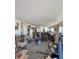 Barn interior with lots of storage, work area, and natural light at 37625 Pheasant Run, Elizabeth, CO 80107