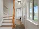 Entryway with a staircase, coat closet, and bright natural light at 37625 Pheasant Run, Elizabeth, CO 80107