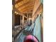 Interior view of a horse stall with wood framing, hay, and equipment at 37625 Pheasant Run, Elizabeth, CO 80107