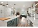 Open concept kitchen with large island and views to the living room at 37625 Pheasant Run, Elizabeth, CO 80107