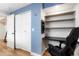Home office space featuring closet, a built-in desk, and shelving at 37625 Pheasant Run, Elizabeth, CO 80107