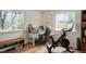 Bright office space with a desk, Peloton bike, and ample natural light at 37625 Pheasant Run, Elizabeth, CO 80107