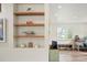 Bright workspace with decorative shelving and natural light at 37625 Pheasant Run, Elizabeth, CO 80107