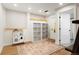 Playroom area with a toy kitchen, cube storage, and neutral-toned hardwood flooring at 37625 Pheasant Run, Elizabeth, CO 80107