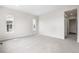 This bedroom features three windows for natural light and plush carpeting at 7392 Timberstone St, Castle Pines, CO 80108