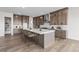 Spacious kitchen with a large center island, modern appliances, and stylish cabinets at 7392 Timberstone St, Castle Pines, CO 80108