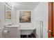 Bathroom features a classic clawfoot tub, modern vanity, and stylish decor at 8821 Blue Creek Rd, Evergreen, CO 80439