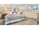 Cozy bedroom with neutral color scheme, plush carpet, and ample natural light at 8821 Blue Creek Rd, Evergreen, CO 80439