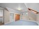 Attic bedroom features a closet and a window providing natural light and ventilation at 8821 Blue Creek Rd, Evergreen, CO 80439