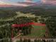 Aerial view of property with approximate lot lines showing the expansive acreage at 8821 Blue Creek Rd, Evergreen, CO 80439